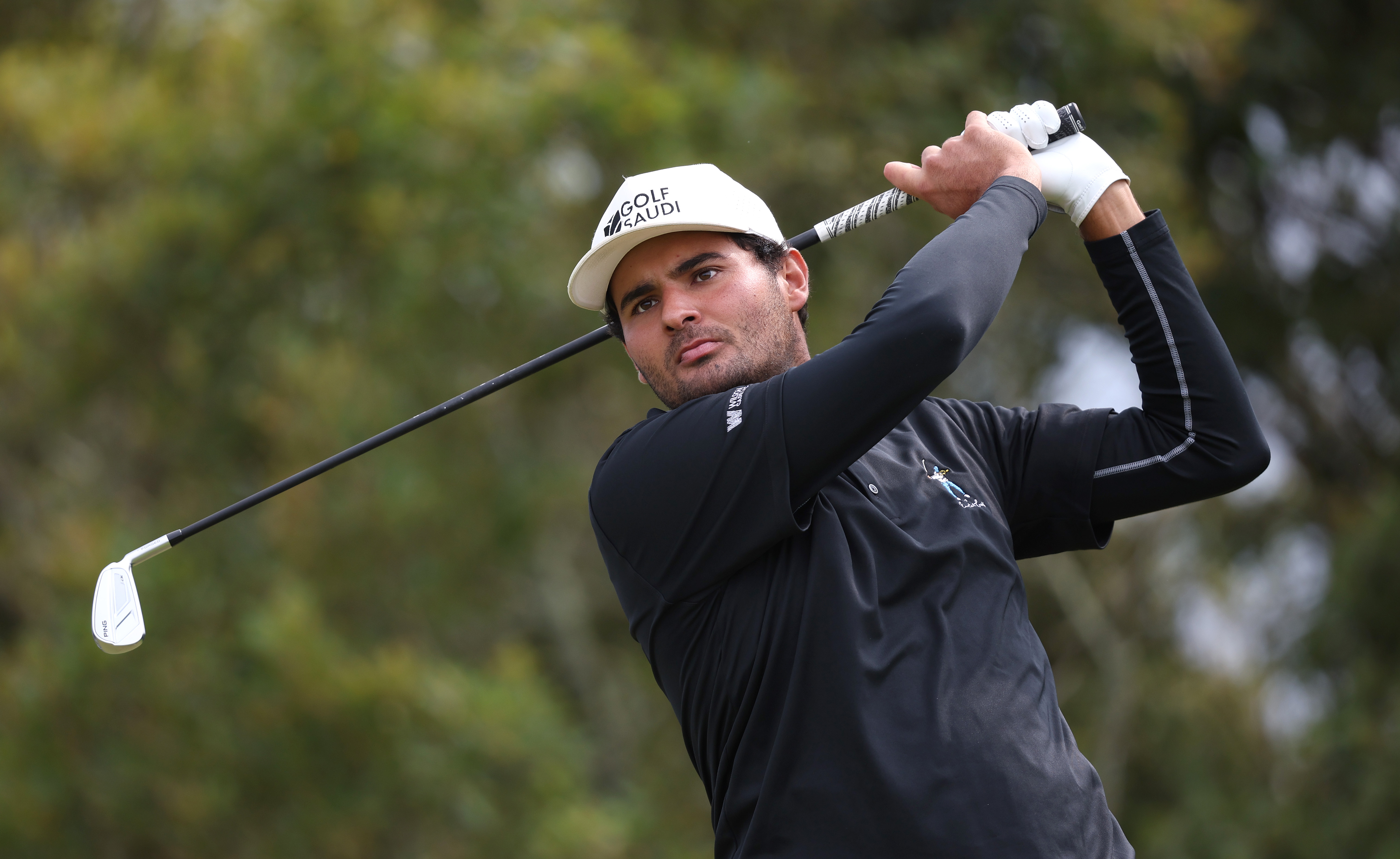 Eugenio Chacarra hits a long iron shot