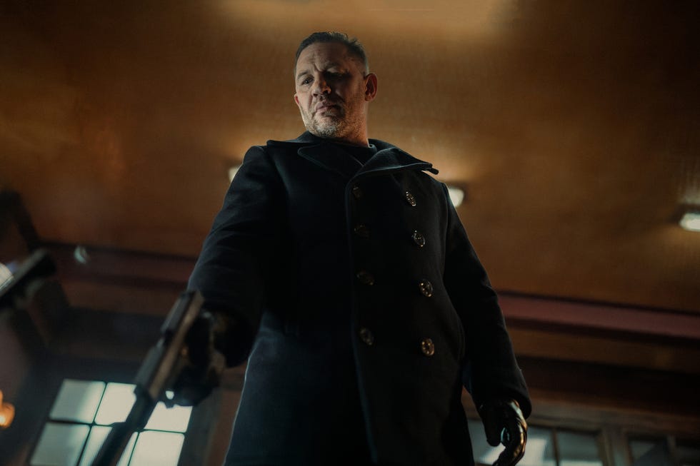 Tom Hardy, Mobland Season 1 tom hardy in mobland season 1 in a black jacket holding a gun