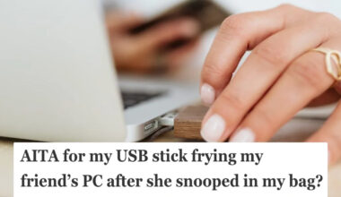 Grocery store employee working in the produce section