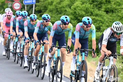 The XDS Astana Team lineup at the front of the peloton during the 2025 Giro d'Italia