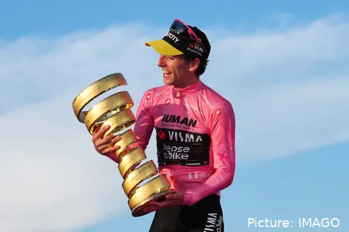 Simon Yates poses with the Giro d'Italia trophy in Rome