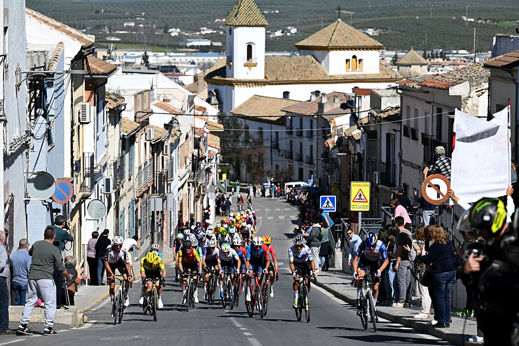 LUCENA, SPAIN - FEBRUARY 22: Jan Christen of Switzerland and UAE Team Emirates - XRG, Bastien Tronchon of France and Team Groupama - FDJ United, Jefferson Alveiro Cepeda of Ecuador and Team Movistar lead the peloton during the 72nd Vuelta a Andalucia Ruta Ciclista Del Sol 2026, Stage 5 a 167.8km stage from La Roda de Andalucia to Lucena on February 22, 2026 in Lucena, Spain. (Photo by Szymon Gruchalski/Getty Images)