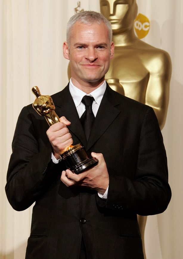 Writer Martin McDonagh poses backstage with his Oscar statuette for Best Live Action Short Film for the film