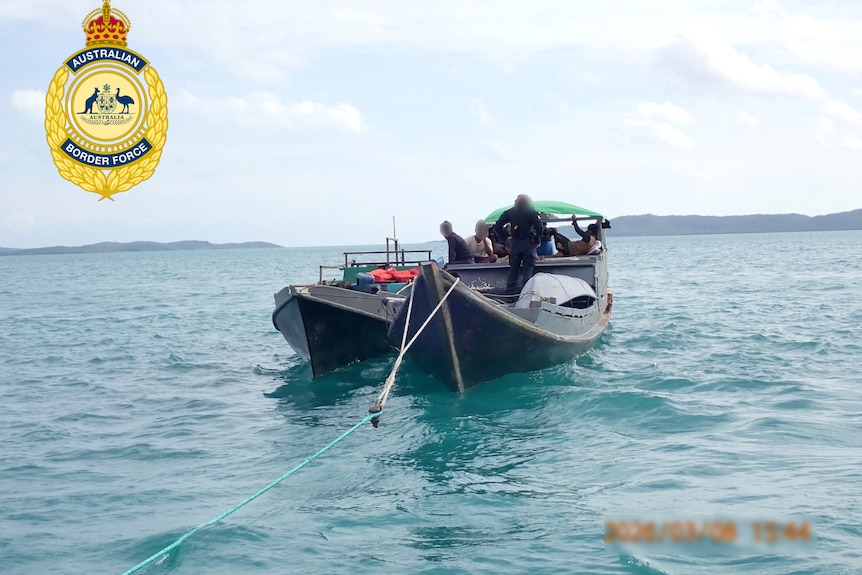 Two boats in the ocean.