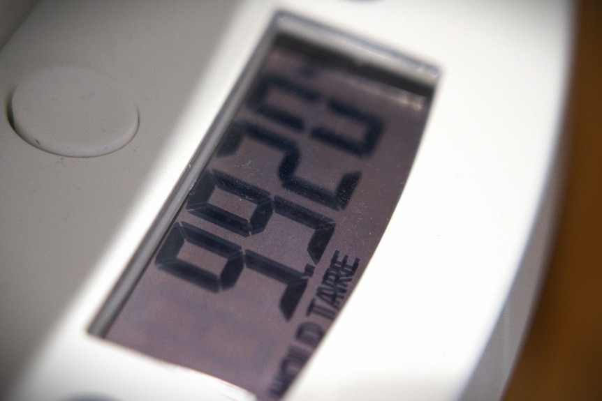 A close up of numbers saying 9.9 on the scales.