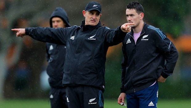 Assistant coach Scott McLeod talks to Will Jordan during an All Blacks training session at Hutt Recreation Ground.