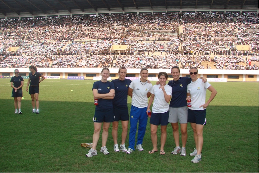 The Matildas pose for a photo after the match against North Korea.