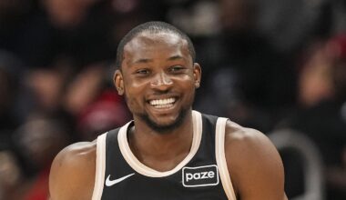 Jonathan Kuminga (0) reacts after making a three point shot against the Washington Wizards during the first half at State Farm Arena