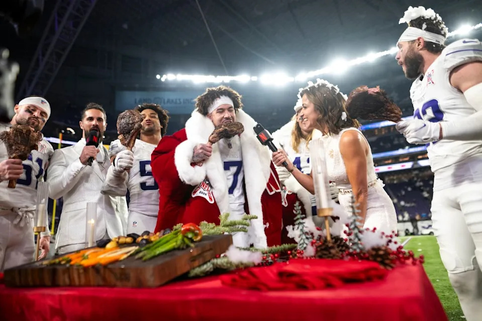 Byron Murphy Jr. #7 of the Minnesota Vikings takes a bite of steak as he is interviewed by Diana Russini on Netflix after the game against the Detroit Lions at U.S. Bank Stadium on December 25, 2025 in Minneapolis, Minnesota. Getty Images