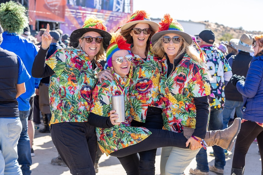 group of happy people in colourful shirts
