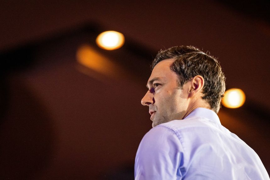 Sen. Jon Ossoff arrives on stage during a re-election campaign event in Atlanta, Georgia, in February.