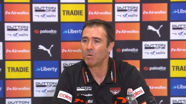 Essendon coach Brad Scott speaks after the game.