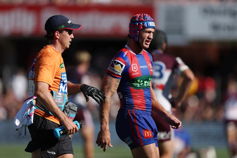  Kalyn Ponga leaves the field injured.