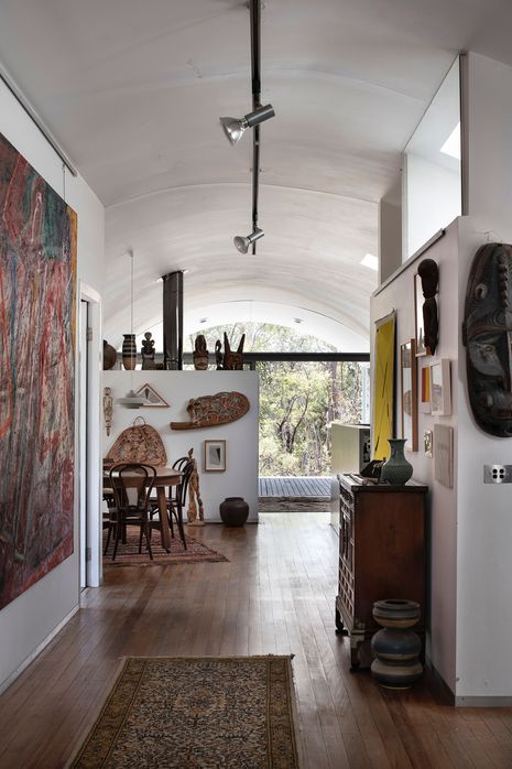 The broad central corridor serves as a gallery space for displaying artworks.