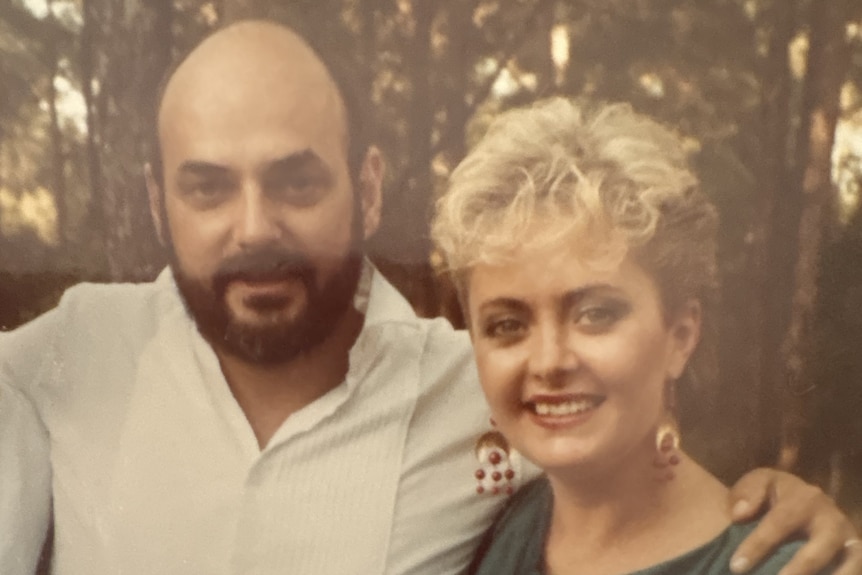 A man and woman pictured smiling at the camera