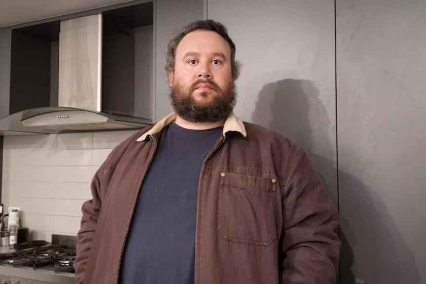 Nicholas Day standing in a kitchen.