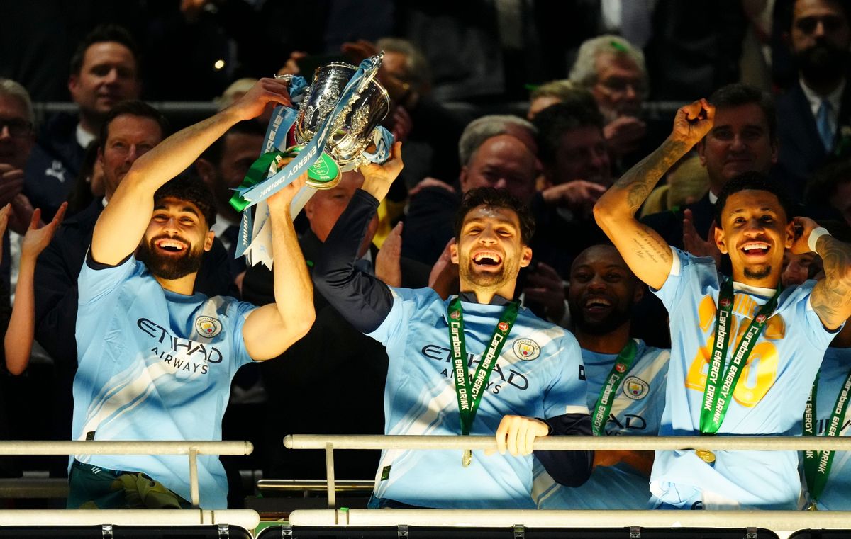Manchester City players lifting the Carabao Cup last weekend