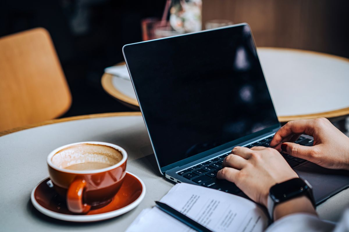 Cropped shot of businesswoman working on laptop in a cafe. Young female entrepreneur running start-up business. Self-employment. Remote working. Flexible working. Business management. Business on the go concepts