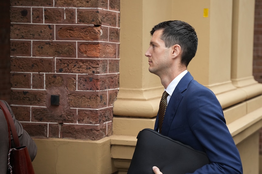 Former Liberal MP Rory Amon walks outside court