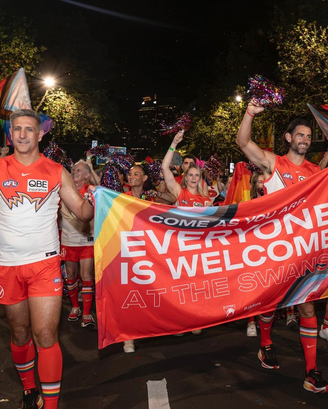 Ex Dockers player Matthew Pavlich at Sydney Gay and Lesbian Mardi Gras with Brodie Brundy.