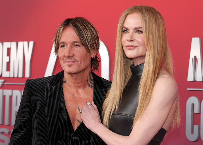 Nicole Kidman and Keith Urban posing together on red carpet, highlighting her comments on their divorce. Nicole Kidman and Keith Urban posing together on red carpet, highlighting her comments on their divorce.
