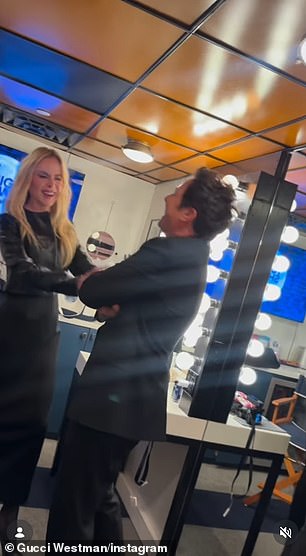 She could be seen interacting with host Jimmy Fallon backstage