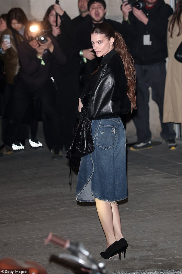 Barbara Sprouse looked effortlessly chic in a black leather bomber jacket and blue denim jorts as she arrived at the event