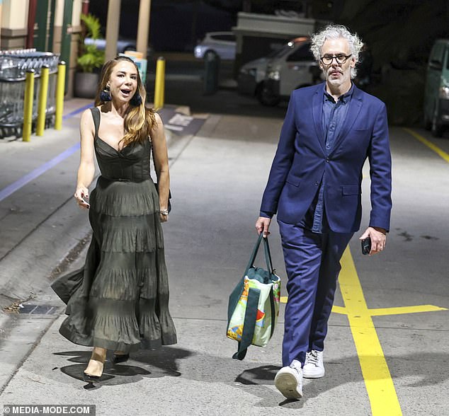 Kate entered the event from a side entrance with her radio show's executive producer, Tom Ivey