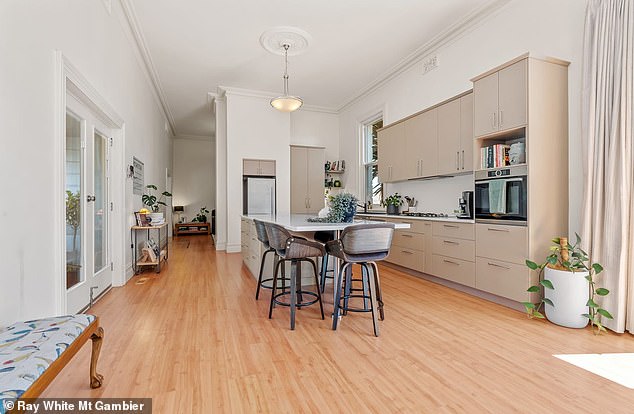 Located just minutes from the famed tourist destination of Blue Lake, the Hodges' Mount Gambier home mixes heritage detail with modern luxury