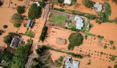 Crews are searching for a missing 71-year-old who allegedly fell into an inundated stream on Saturday as officials urged people in hard-hit areas across Oahu (pictured) and Maui to evacuate
