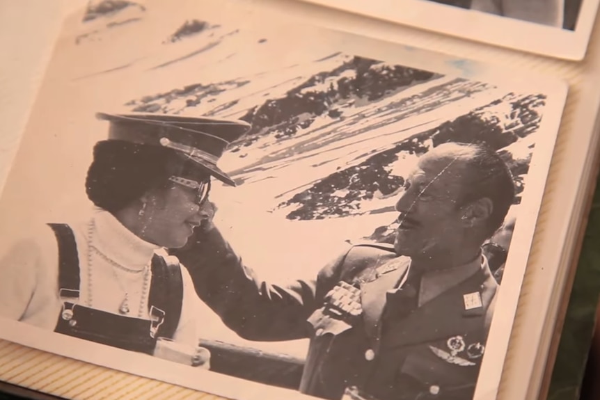 A picture of a black-and-white photograph of two people in military uniforms.