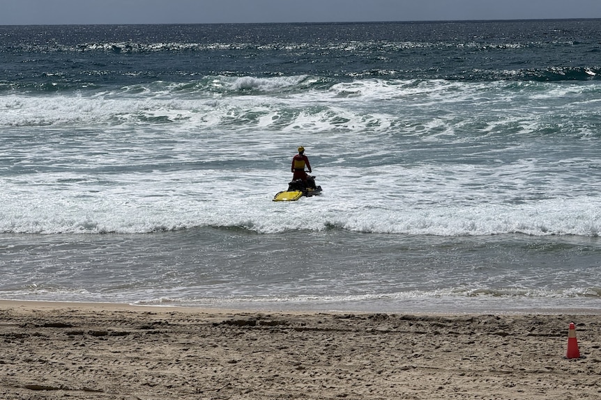 Lifesaver in the ocean on a jet ski