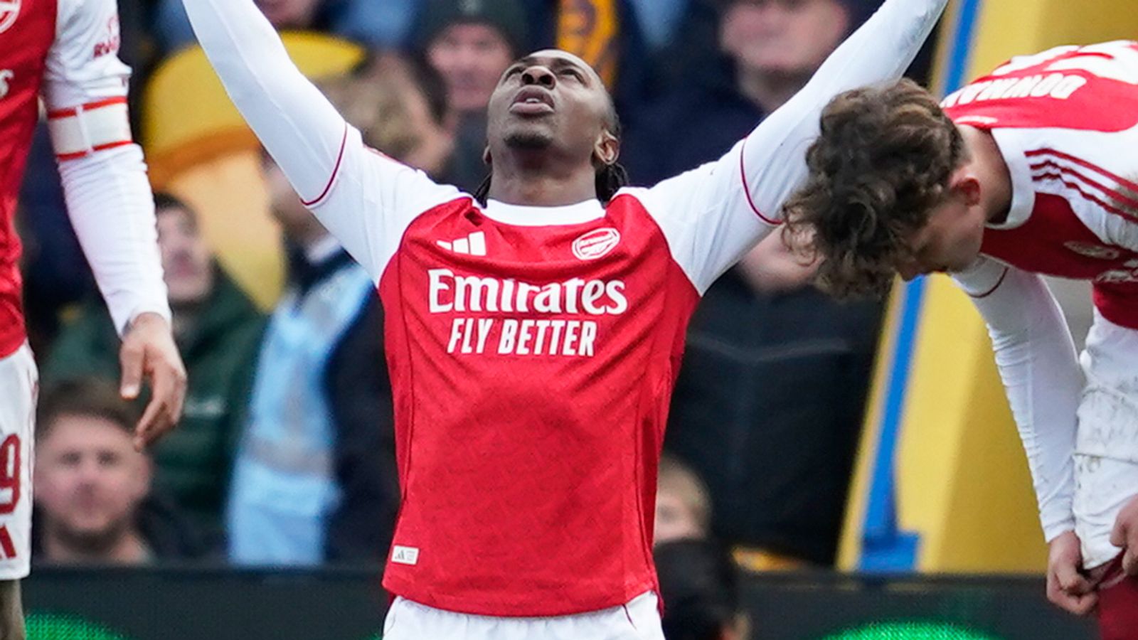 Eberechi Eze celebrates after firing Arsenal into a 2-1 lead at Mansfield