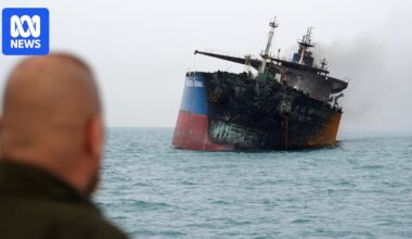 Oil tankers burn as Iran's new leader vows to keep Strait of Hormuz closed