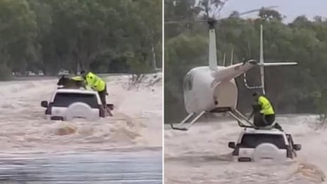 Dog rescued by helicopter from raging flood waters in Northern Territory – video