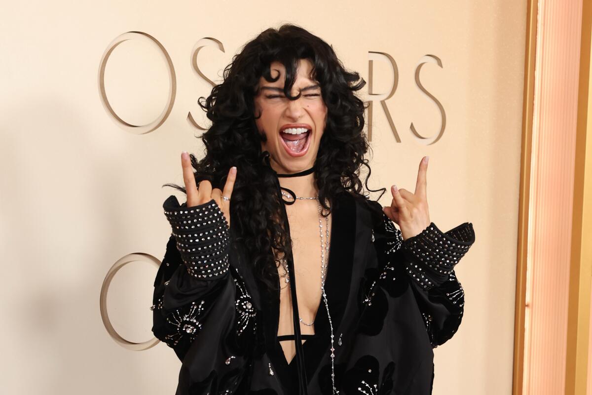 Odessa A'zion arrives on the red carpet at the Oscars