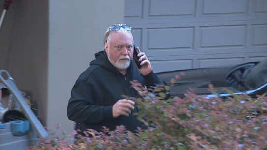 Kyle Sandilands, pictured at home last week, has hired a crack legal team.