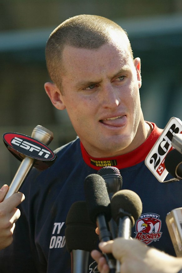 Chris Walker speaking to media in 2003.