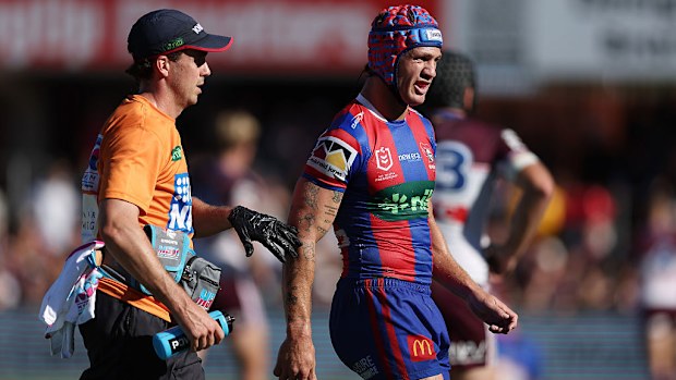 Kalyn Ponga leaves the field injured.