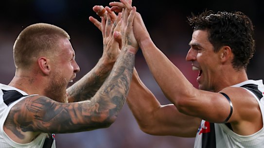 Power play. Jordan De Goey and Scott Pendlebury used to effect off the bench.