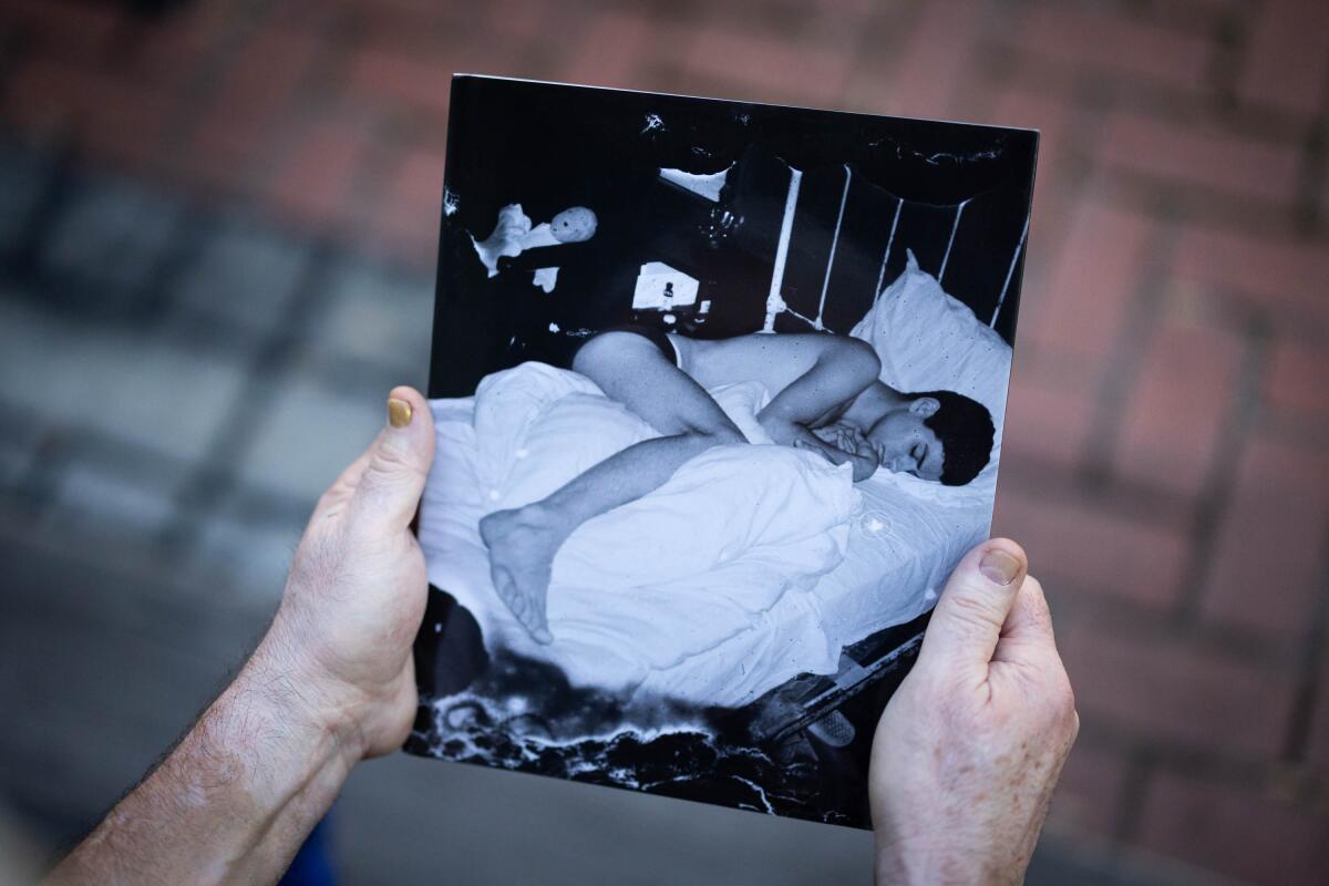 Rivera holds his new book, "Propiedad Privada."