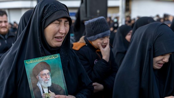 Women weep after Iranian state media confirmed the death of Ayatollah Ali Khamenei.