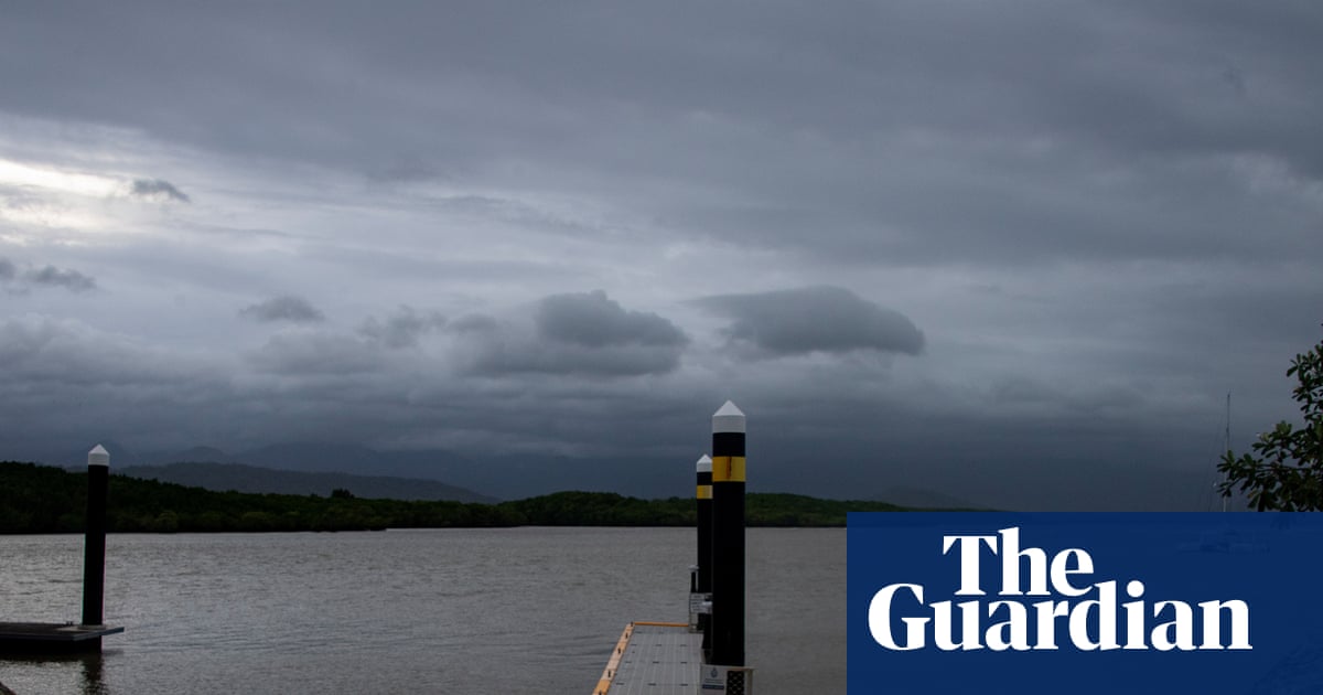 Tropical Cyclone Narelle hits far north Queensland as 250km/h winds tear off roofs and fell trees | Tropical Cyclone Narelle