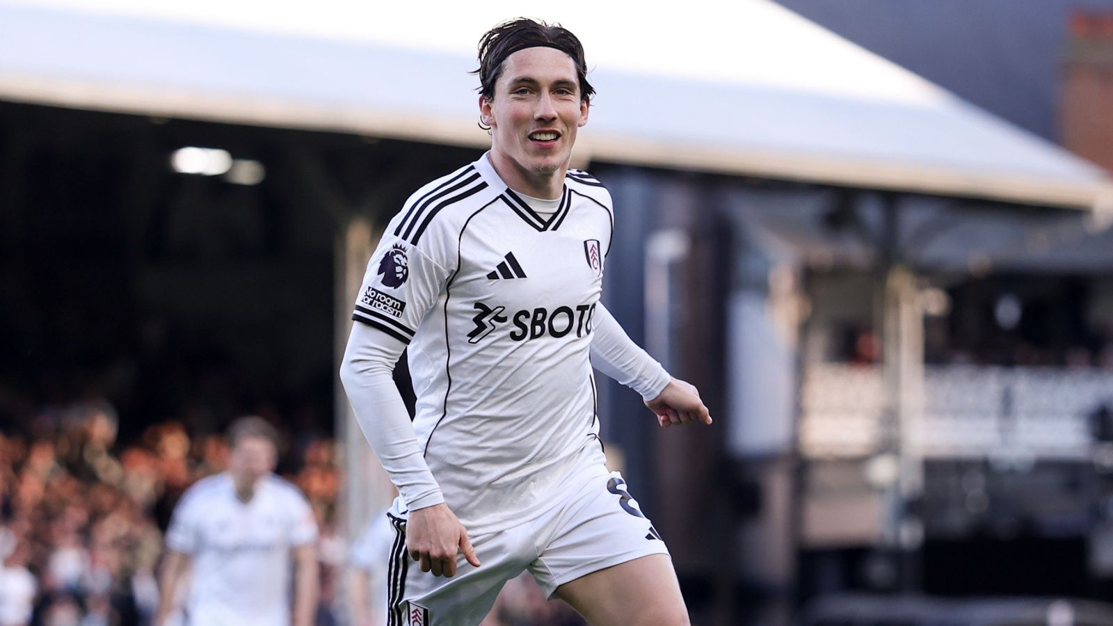 Harry Wilson celebrates after scoring give Fulham a 2-1 lead against Burnley