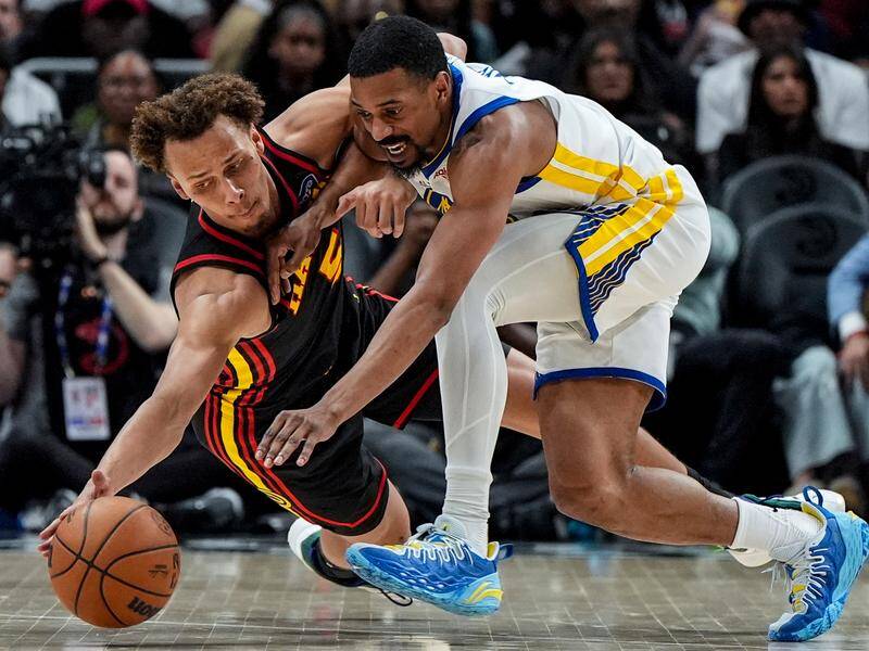 Defensive maestro Dyson Daniels (left) had a high-scoring game to help Atlanta beat Golden State. Photo: AP PHOTO