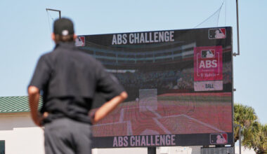 Umpire Ryan Additon watches as a call is challenged using MLB