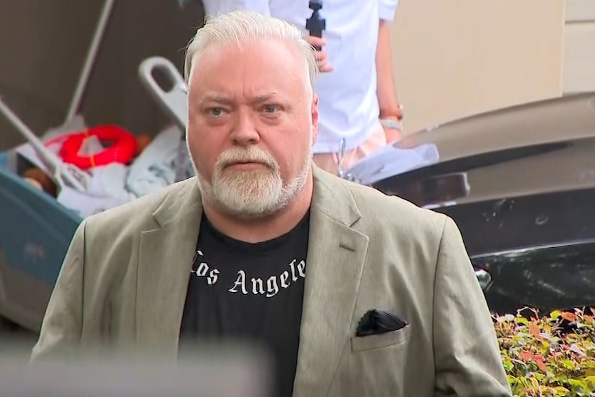 Kyle Sandilands outside his home