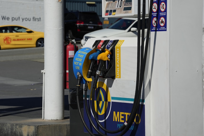 A mid-shot of a petrol bowser in Albany with a blue sign attached to the diesel pump after it ran out of diesel.