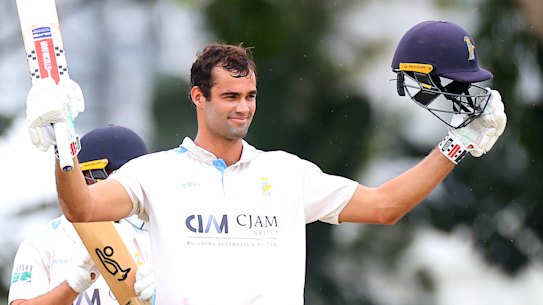 Hugo Burdon after reaching his triple century in the Queensland Premier Cricket first grade final. His batting partner Stephan Muller finished on 272 not out.