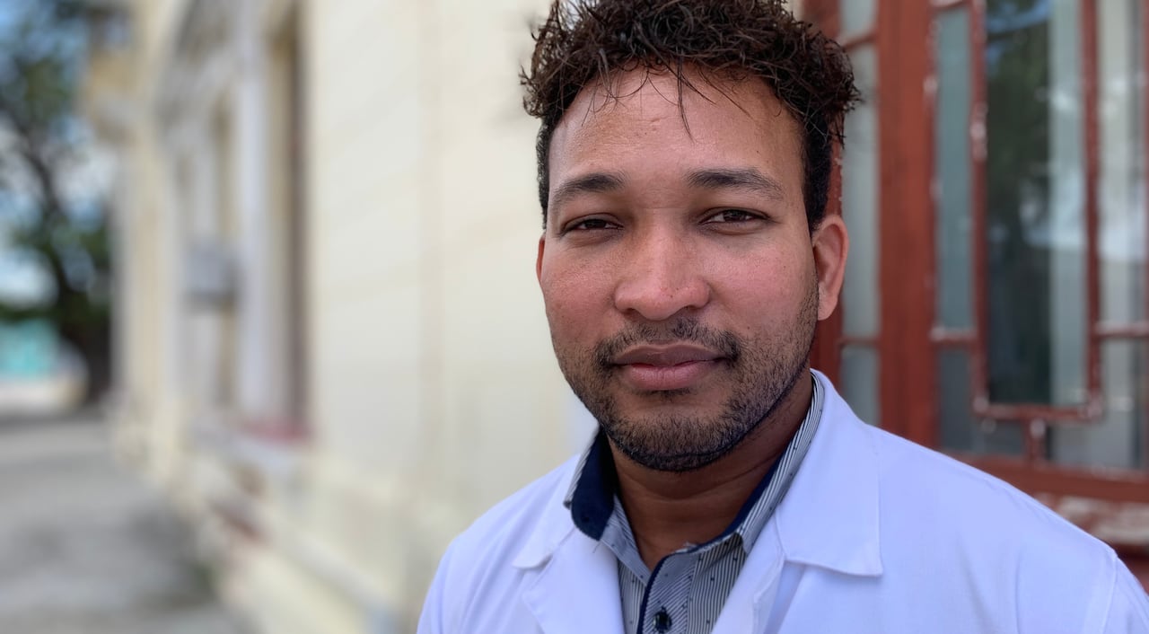 doctor head and shoulders shot - standing outside - in cuba 